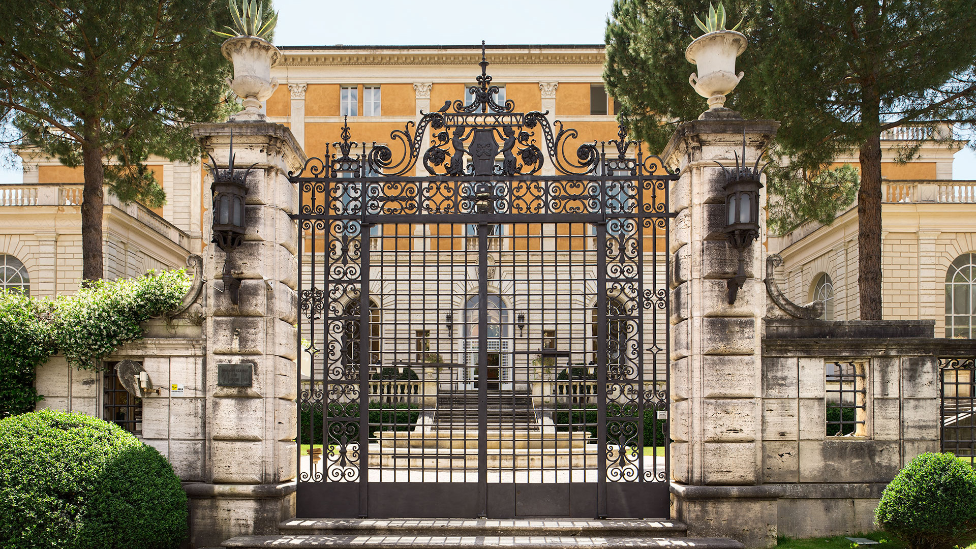 Color photograph of the front gates of the American Academy in Rome
