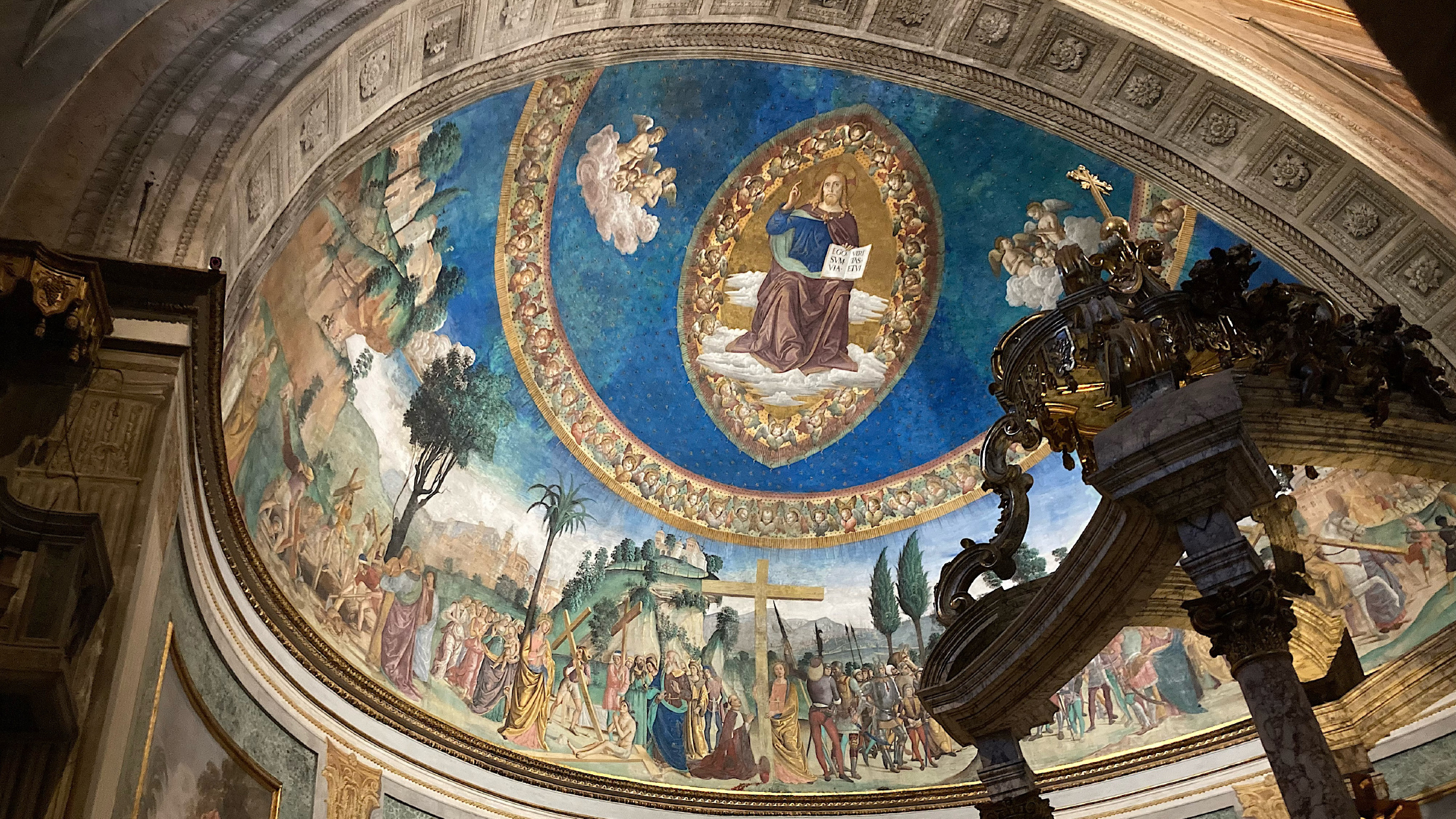 Color photograph of a religious Renaissance mural painting inside a church dome