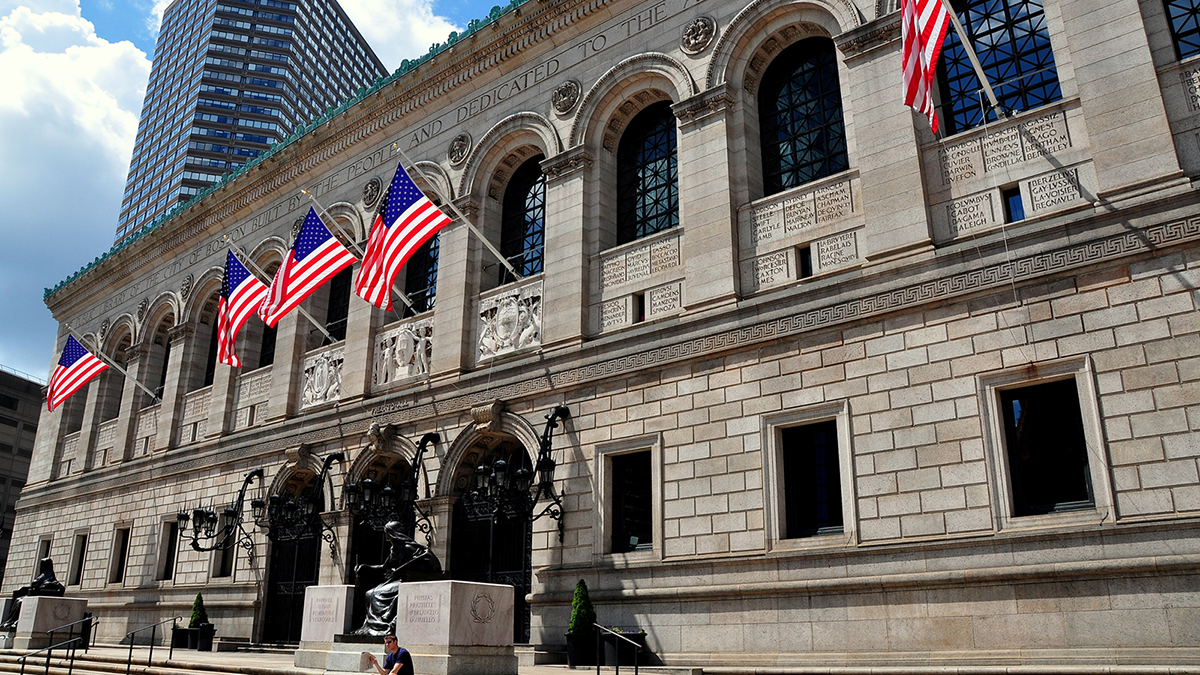 The neo-Renaissance facade of the venerable Boston Public Library in Copley Square designed by McKim, Mead, &amp; White and built in 1888 (photograph © Lei Xu | Dreamstime.com)