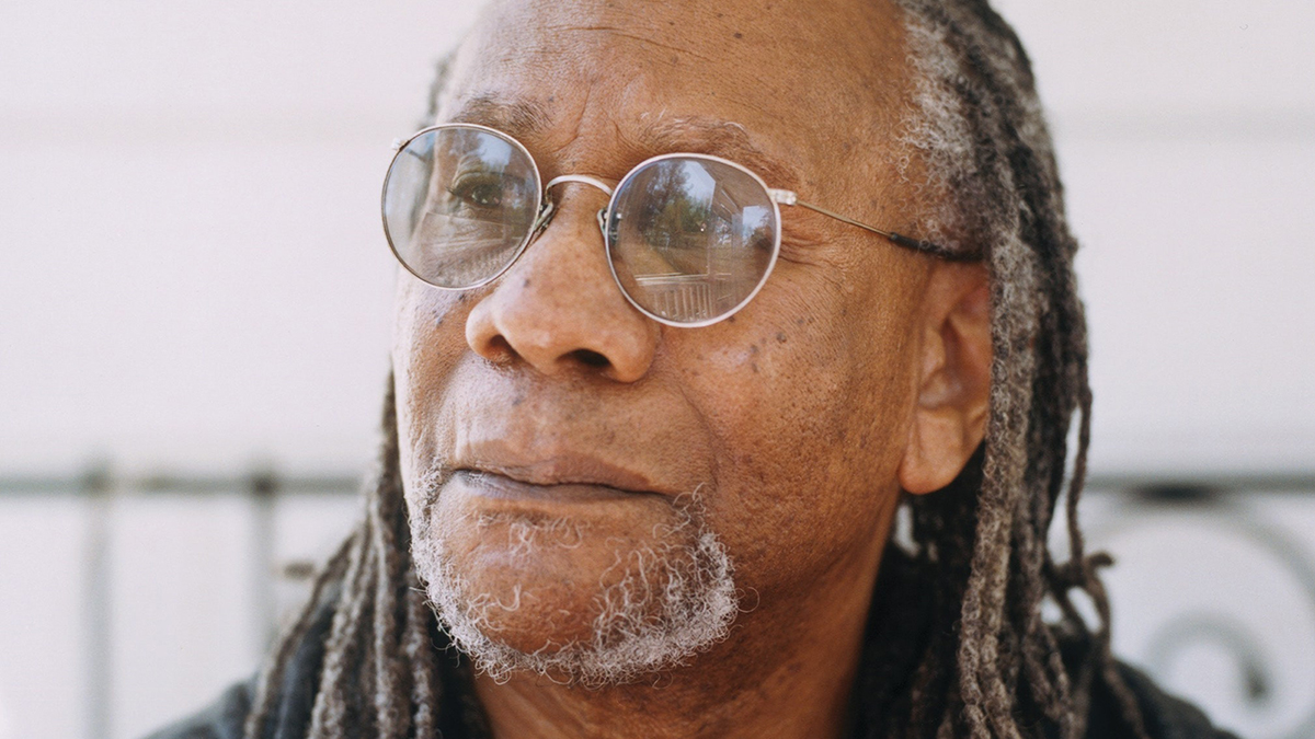 Color photograph of the face of Nathaniel Mackey looking to the left