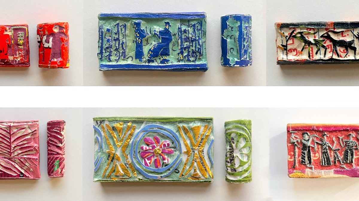 Color photograph of several painted ceramic artworks made to look like ancient artifacts