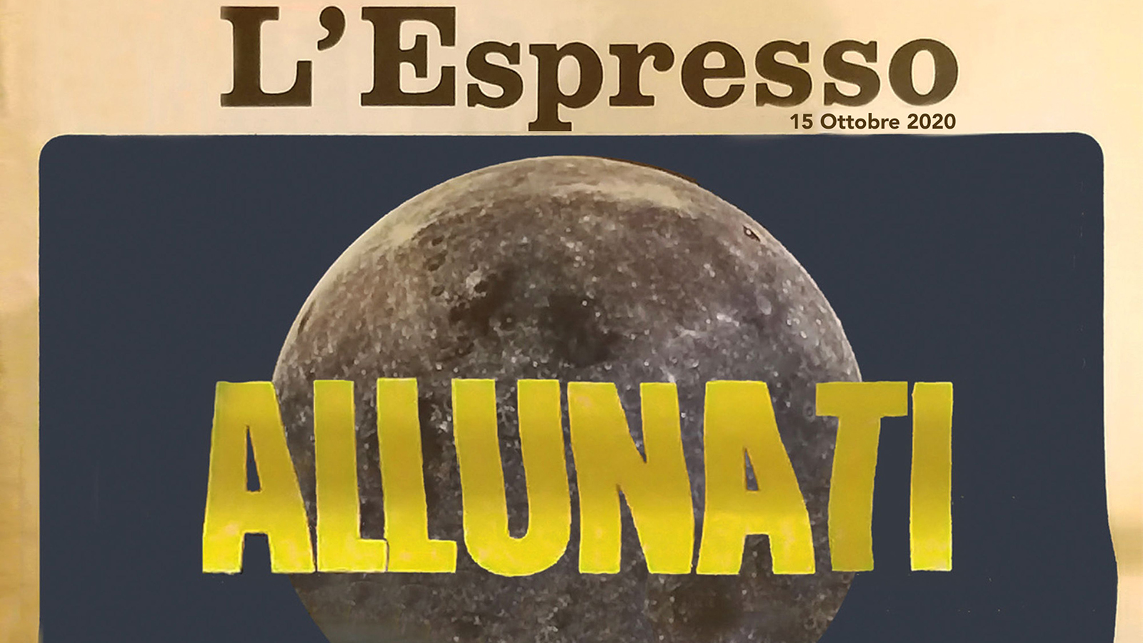 Color image of a detail of the front page of the newspaper L'Espresso with the word ALLUNATI in yellow letters superimposed on the top half of an image of the Earth