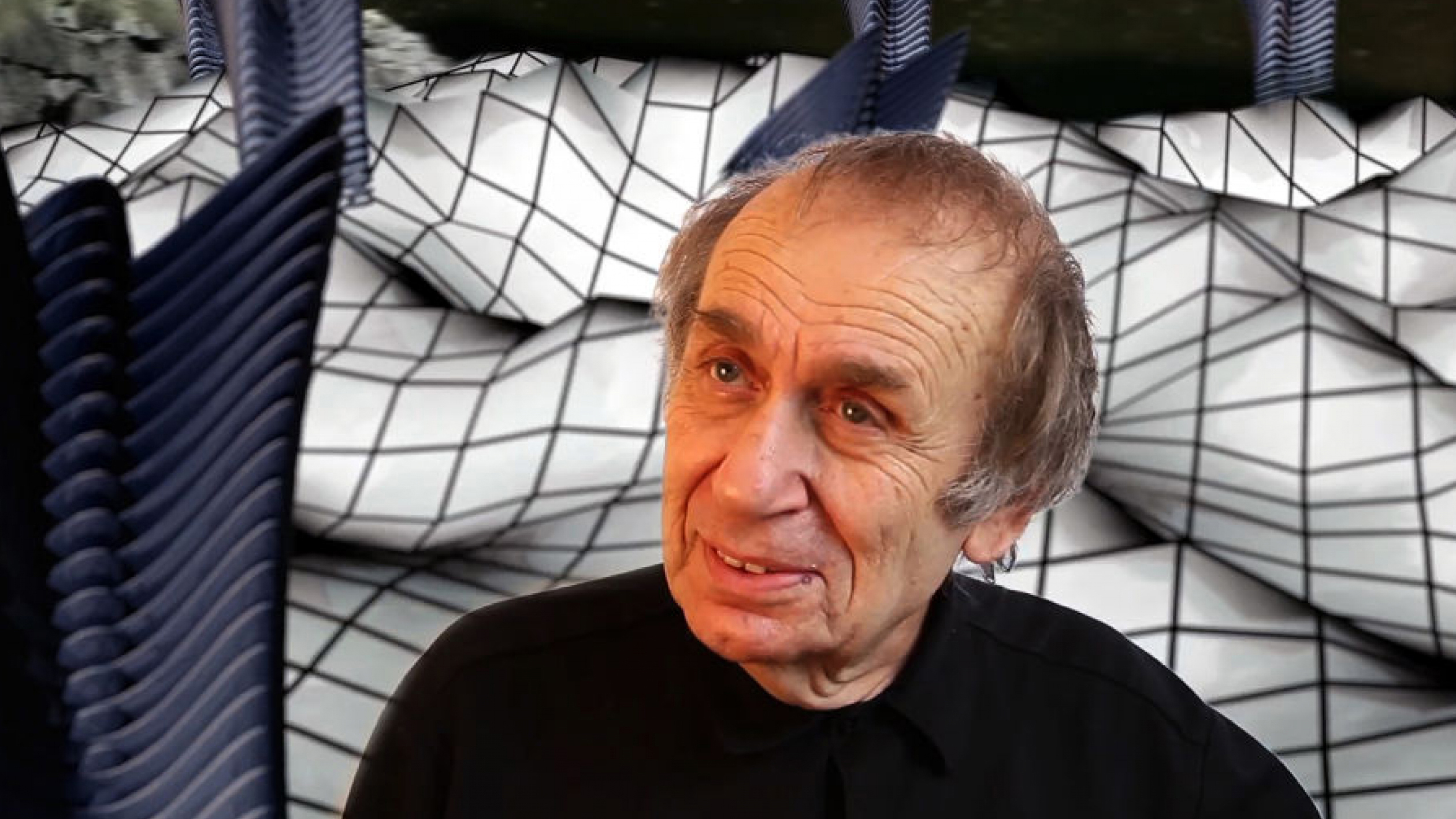Color photograph of the head and shoulders of Vito Acconci
